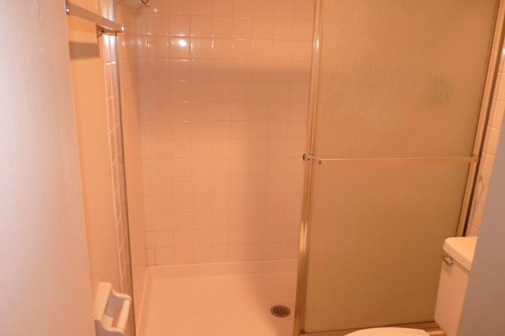 111 Woodland Road Palm Springs, FL 33461 - Photo 14 of 24 MASTER BATHROOM SHOWER