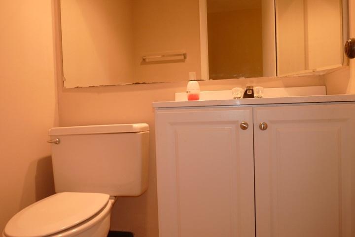 111 Woodland Road Palm Springs, FL 33461 - Photo 21 of 24 HALF BATHROOM DOWNSTAIRS