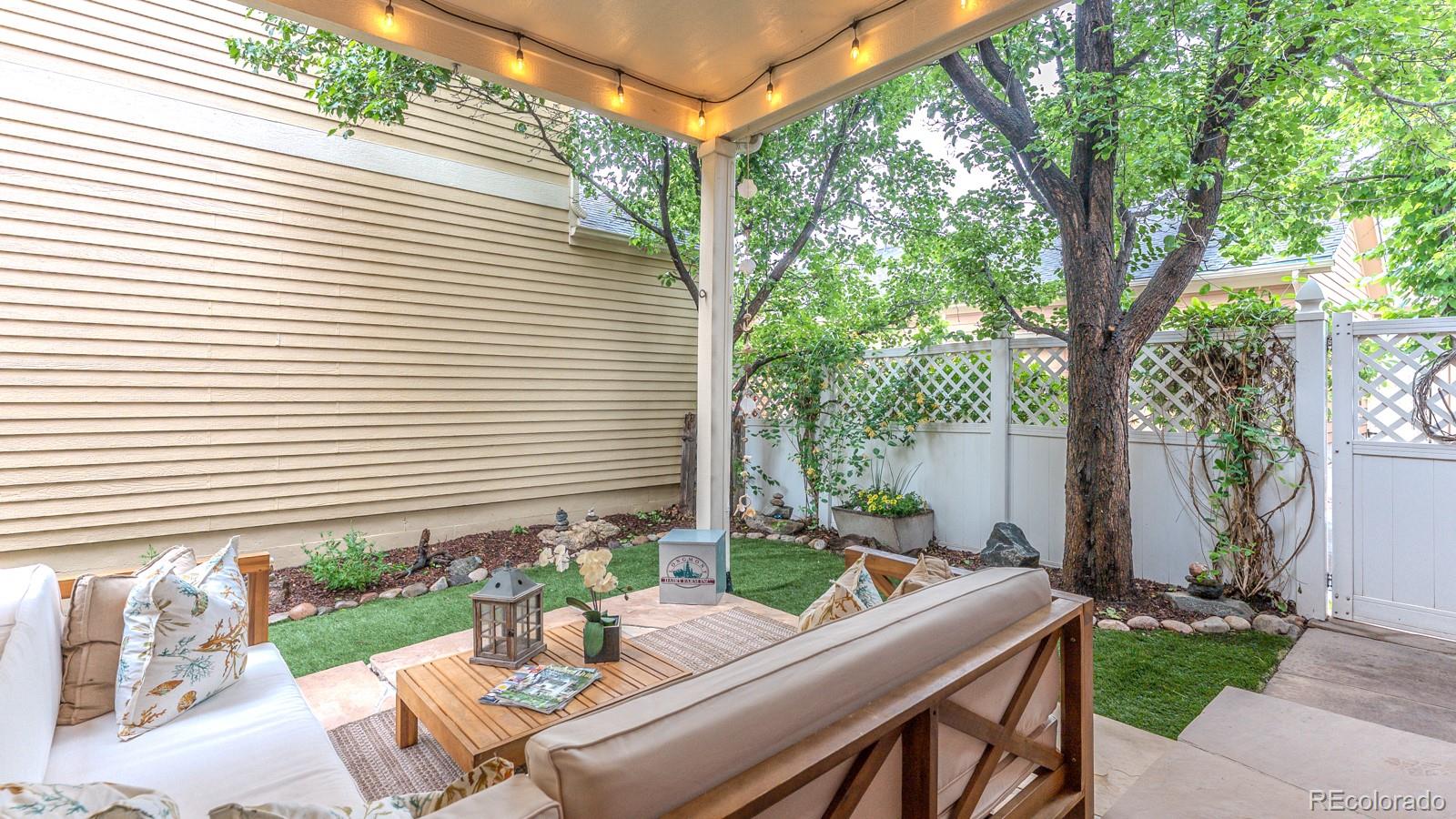 8367 Devinney Street Arvada, CO 80005 - Photo 10 of 41 a house view with a seating space