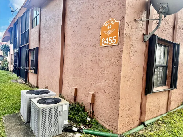 a view of an entryway with garden