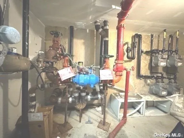 a living room filled with table and chairs