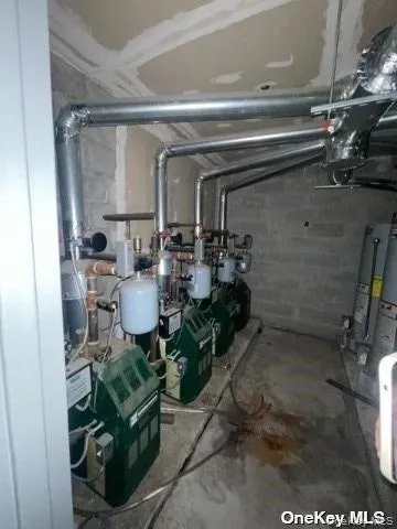 a living room with patio furniture and a potted plant