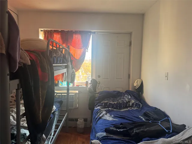 a room with a bed and a window