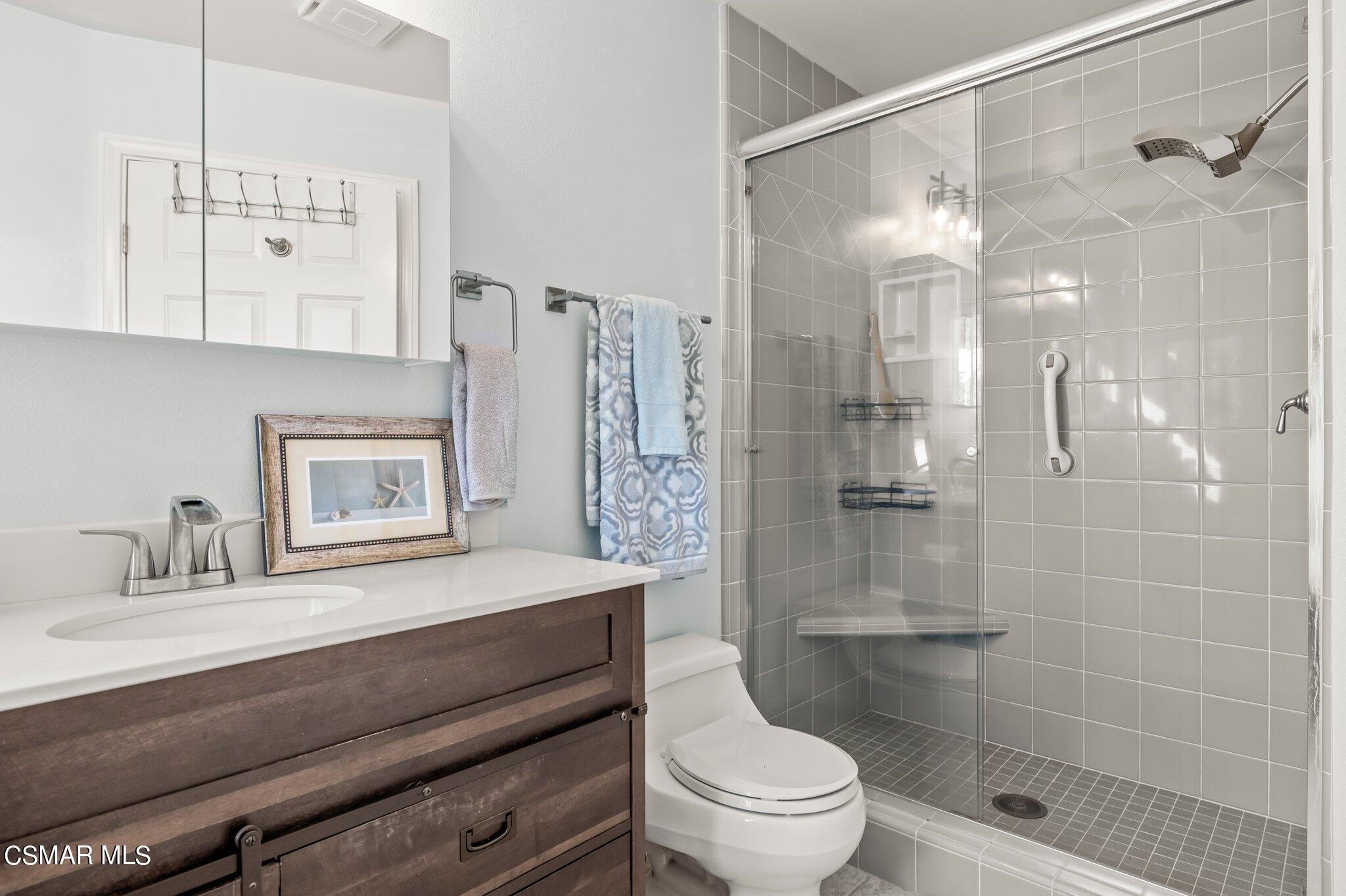 3207 Foothill Road Ventura, CA 93003 - Photo 54 of 83 a bathroom with a sink a toilet and shower