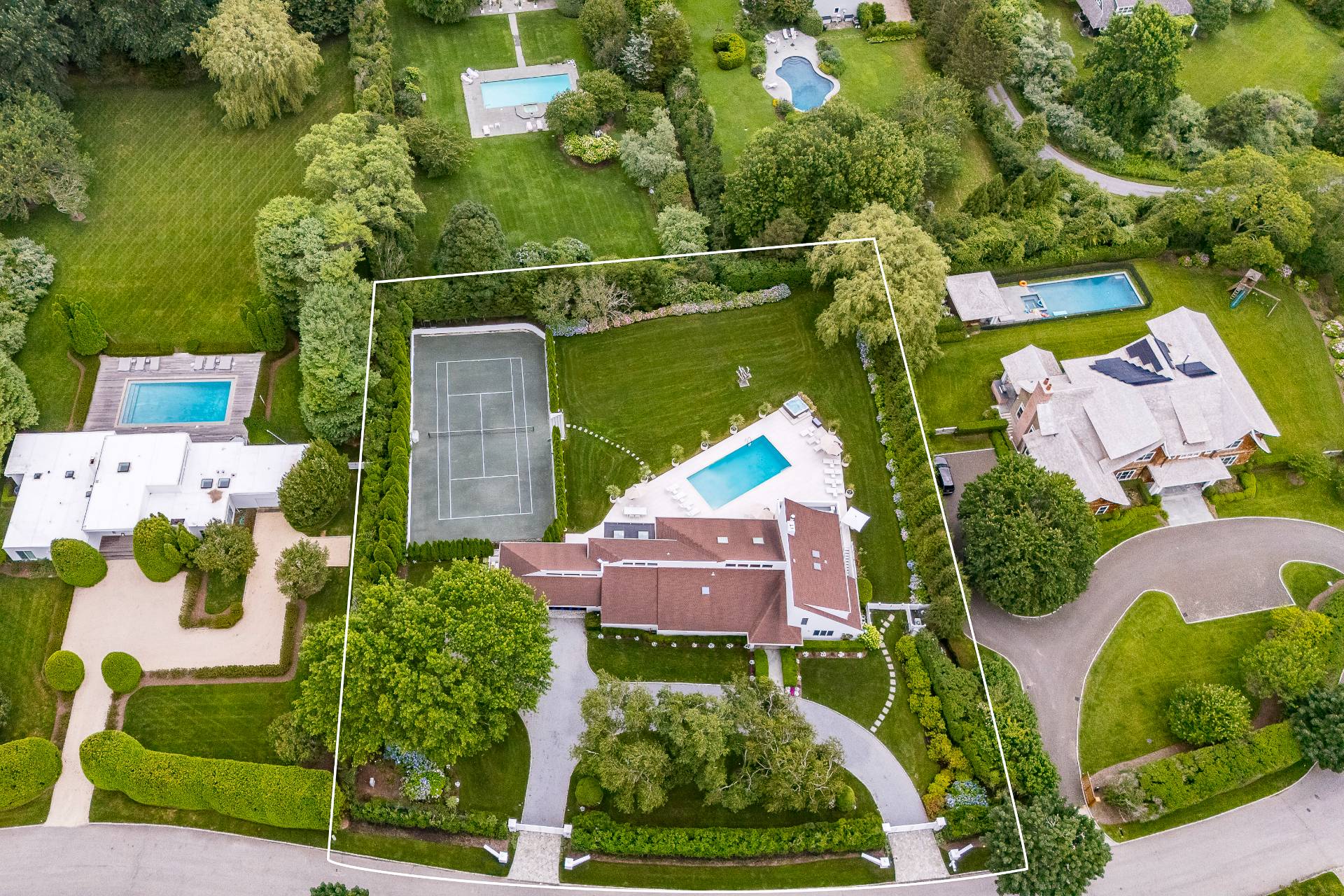 24 South Potato Barn Road Water Mill, NY 11976 - Photo 2 of 42 an aerial view of house with a yard