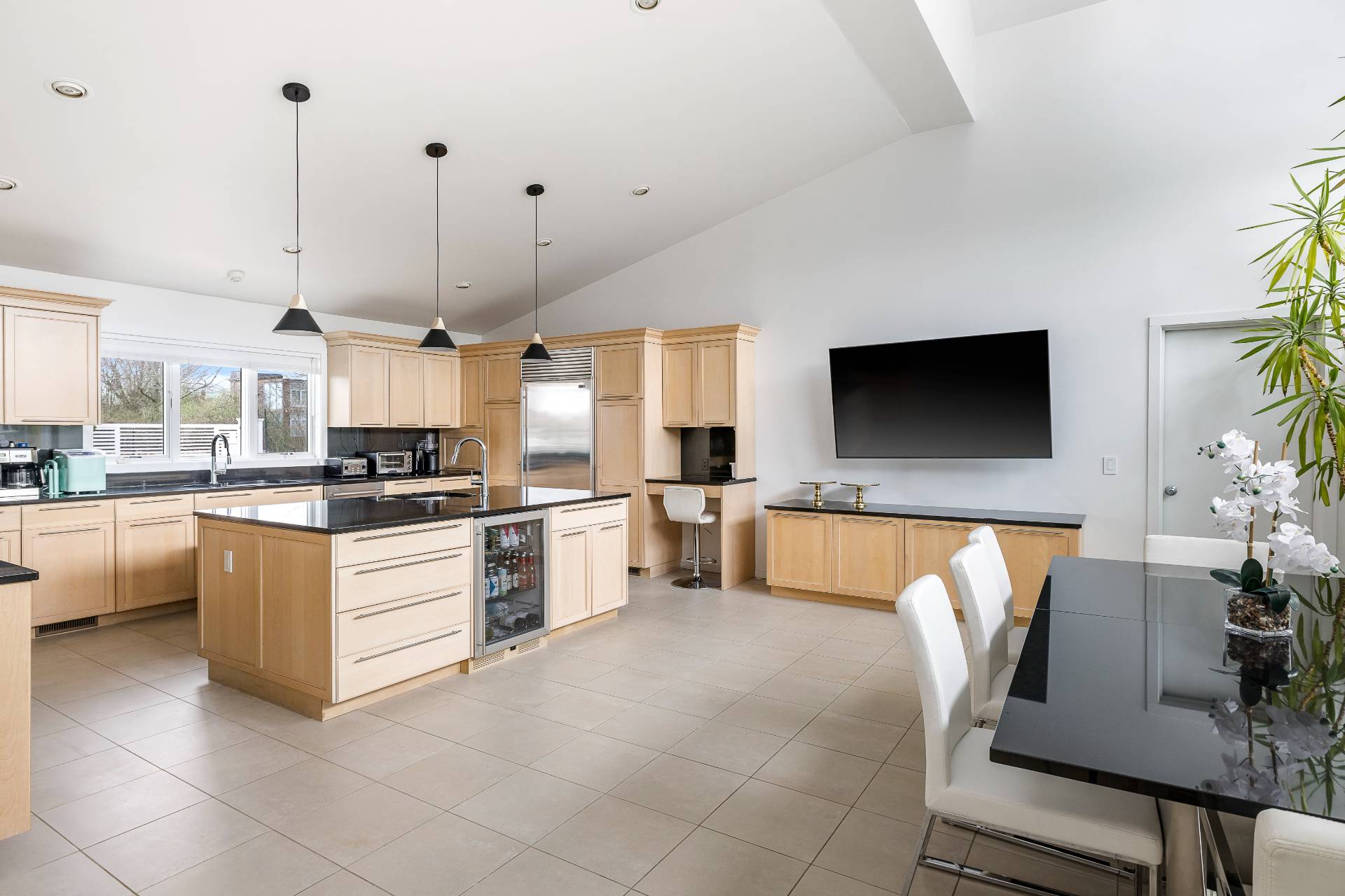 24 South Potato Barn Road Water Mill, NY 11976 - Photo 24 of 42 a large kitchen with stainless steel appliances kitchen island granite countertop a sink and a granite counter tops