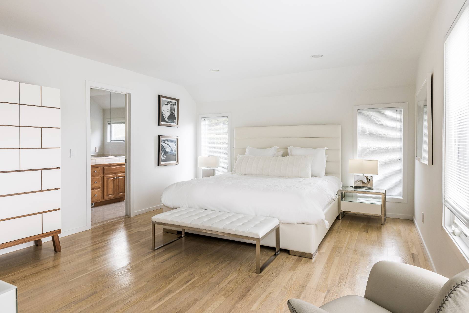 24 South Potato Barn Road Water Mill, NY 11976 - Photo 32 of 42 a spacious bedroom with a bed and a couch