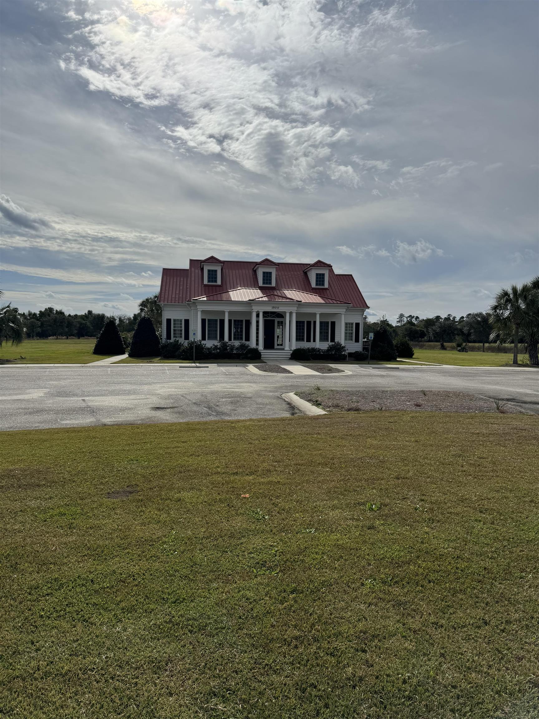 Lot 7 Cravens Grant Georgetown, SC 29440 - Photo 16 of 19 View of front of the clubhouse
