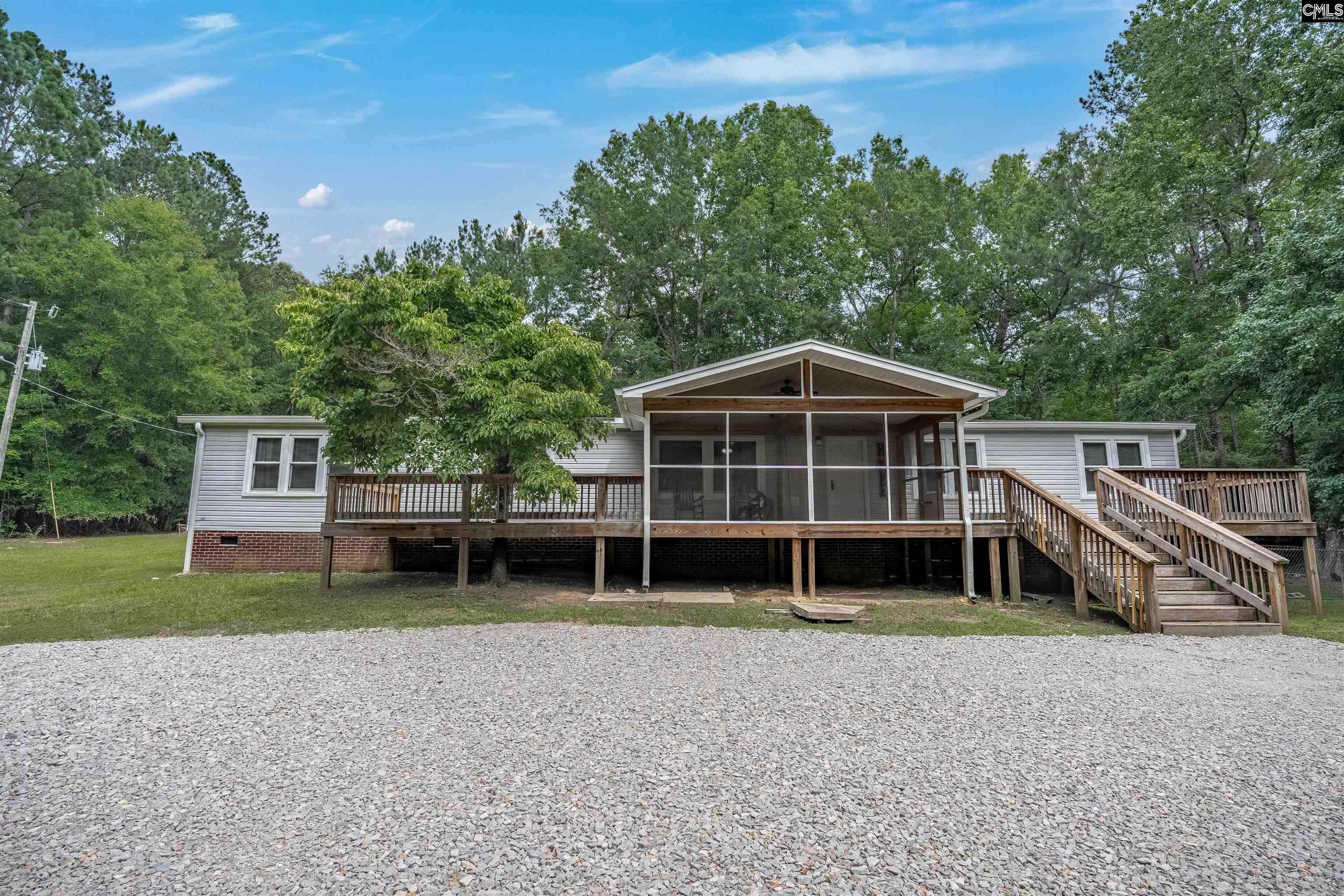 304 Cooper Road Blythewood, SC 29016 - Photo 28 of 29 a front view of a house with a yard and garage