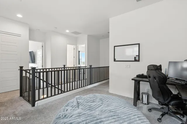 a bedroom with a bed and television