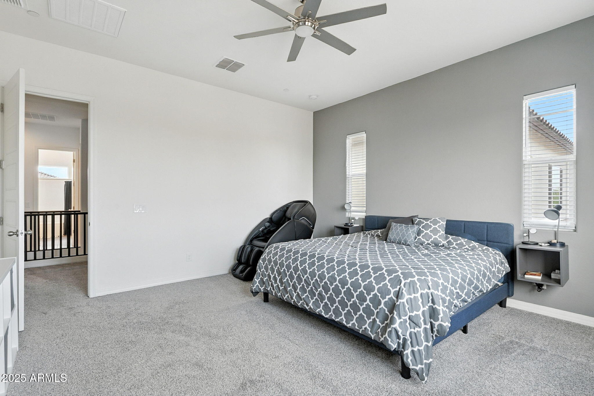 7236 West Phelps Road Peoria, AZ 85382 - Photo 39 of 53 a bedroom with a bed and window