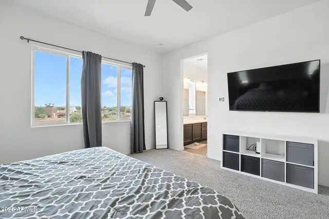 a bathroom with a double vanity sink mirror and shower