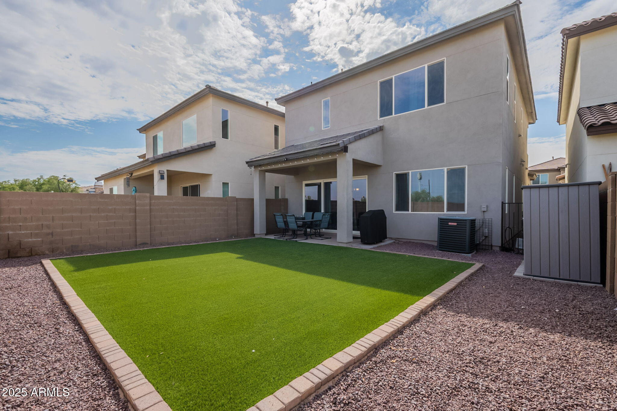 7236 West Phelps Road Peoria, AZ 85382 - Photo 48 of 53 a view of a house with backyard and porch