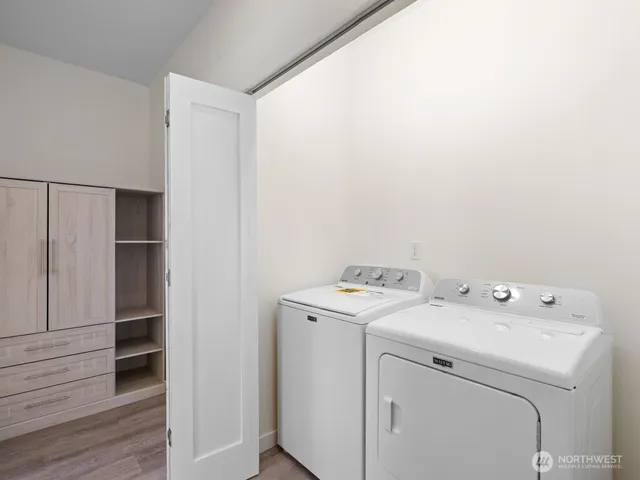 a utility room with dryer and washer