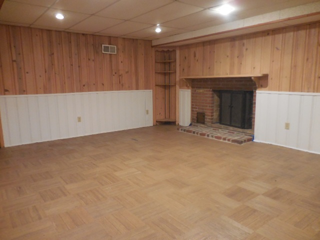 5159 Spring Creek Road Rockford, IL 61114 - Photo 18 of 25 a view of an empty room with a fireplace