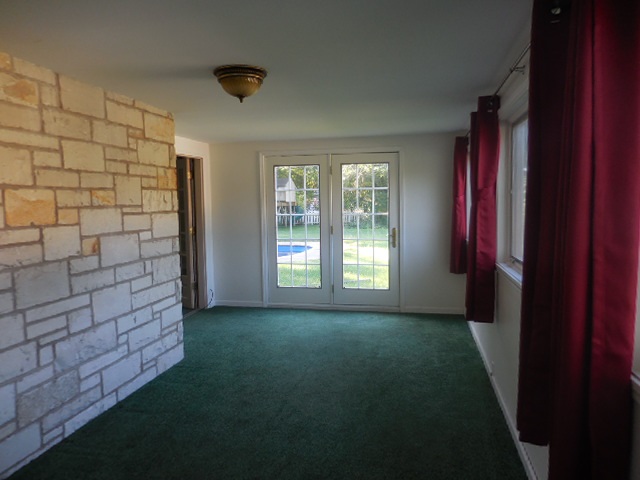 5159 Spring Creek Road Rockford, IL 61114 - Photo 7 of 25 a view of empty room with windows