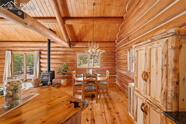 35 Toms Ranch Rd Lake Lake George, CO 80827 - Photo 10 of 50 Dining area with custom antler chandelier, open to living and kitchen