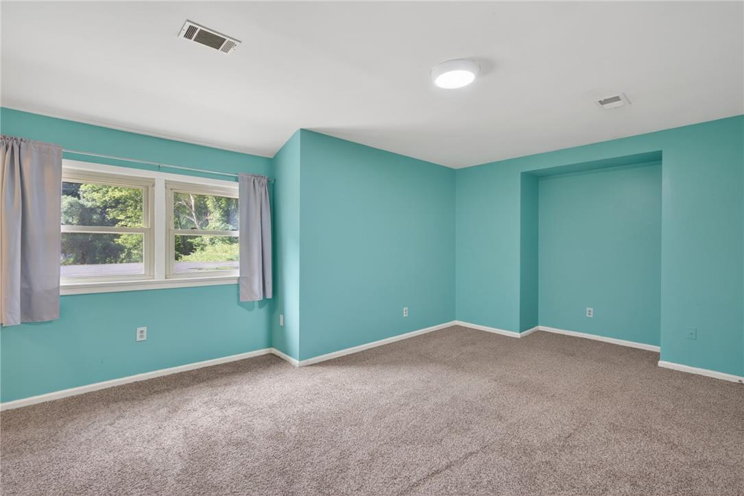 1371 Stoke Park Road Bethlehem, PA 18017 - Photo 44 of 55 a view of an empty room with a window and closet