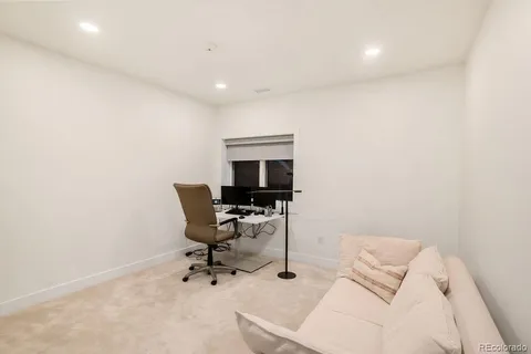 a view of balcony with furniture