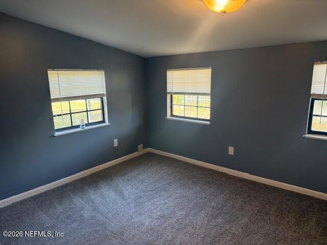 8114 Fresca Street Jacksonville, FL 32217 - Photo 11 of 29 an empty room with a window
