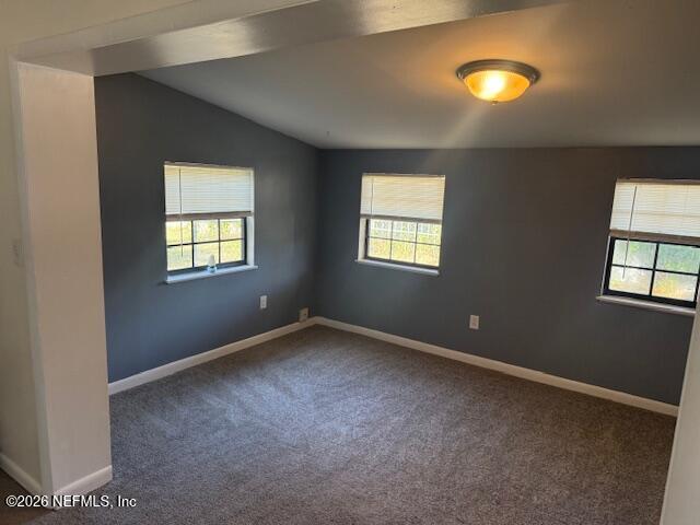 8114 Fresca Street Jacksonville, FL 32217 - Photo 12 of 29 a view of an empty room with a window