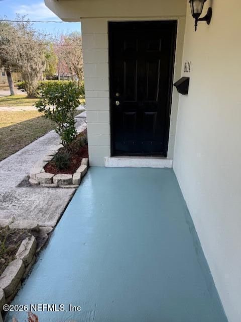 8114 Fresca Street Jacksonville, FL 32217 - Photo 2 of 29 a view of a entryway door of the house