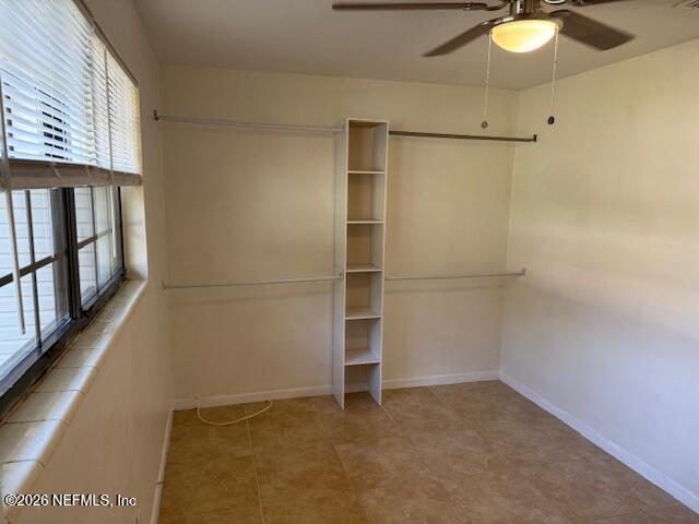 8114 Fresca Street Jacksonville, FL 32217 - Photo 22 of 29 a view of an empty room with a window