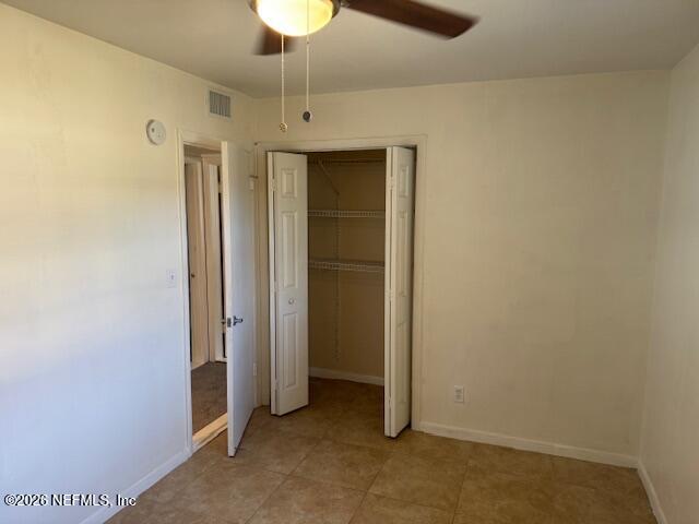 8114 Fresca Street Jacksonville, FL 32217 - Photo 23 of 29 an empty room with a empty space and a hallway