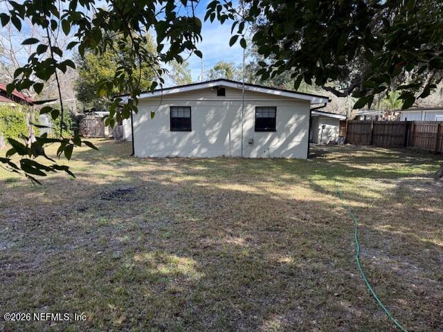 8114 Fresca Street Jacksonville, FL 32217 - Photo 29 of 29 a view of a house with a yard