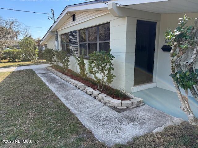 8114 Fresca Street Jacksonville, FL 32217 - Photo 3 of 29 a front view of a house with garden