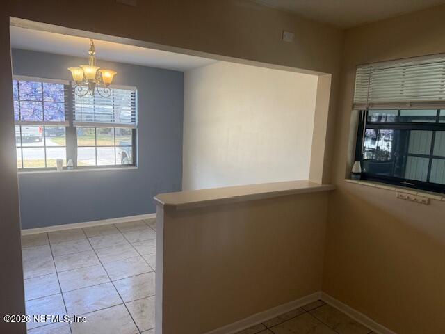 8114 Fresca Street Jacksonville, FL 32217 - Photo 6 of 29 an empty room with windows