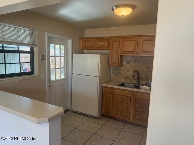 8114 Fresca Street Jacksonville, FL 32217 - Photo 7 of 29 a kitchen with stainless steel appliances granite countertop a refrigerator and a sink