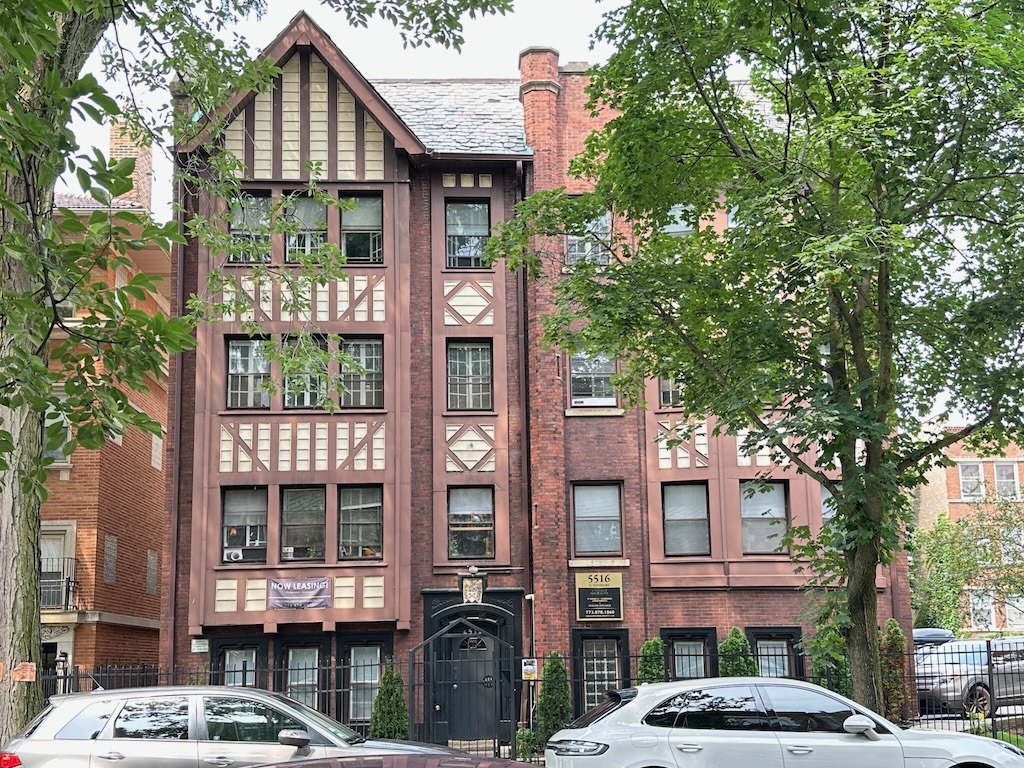 a front view of a houses on city street