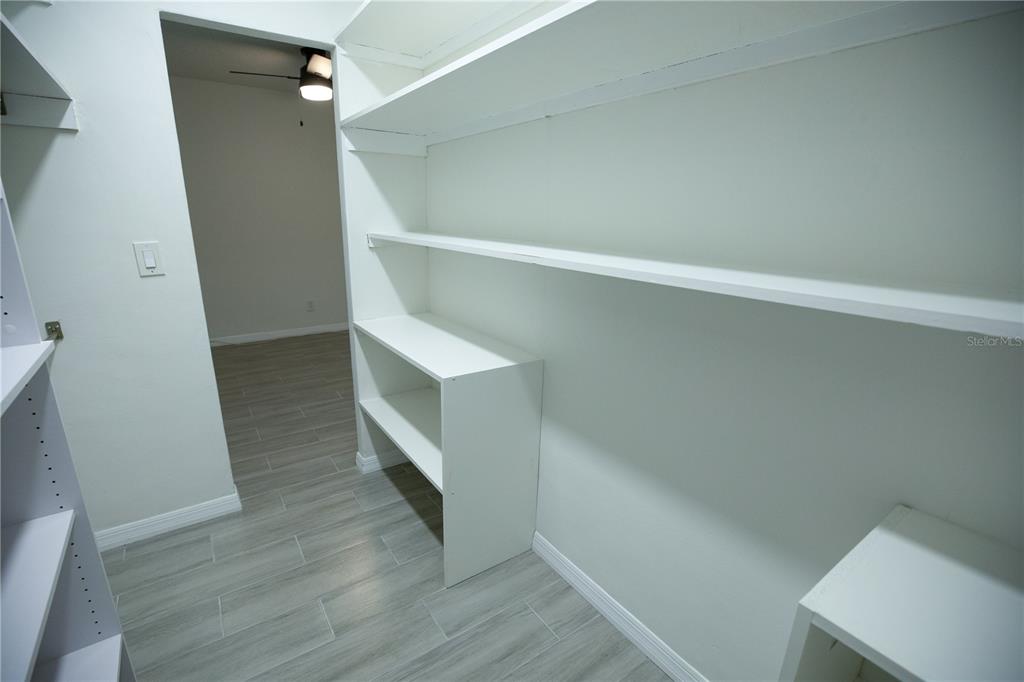 250 Rosery Road Northwest, Unit 227 Largo, FL 33770 - Photo 15 of 18 a view of an empty walk in closet
