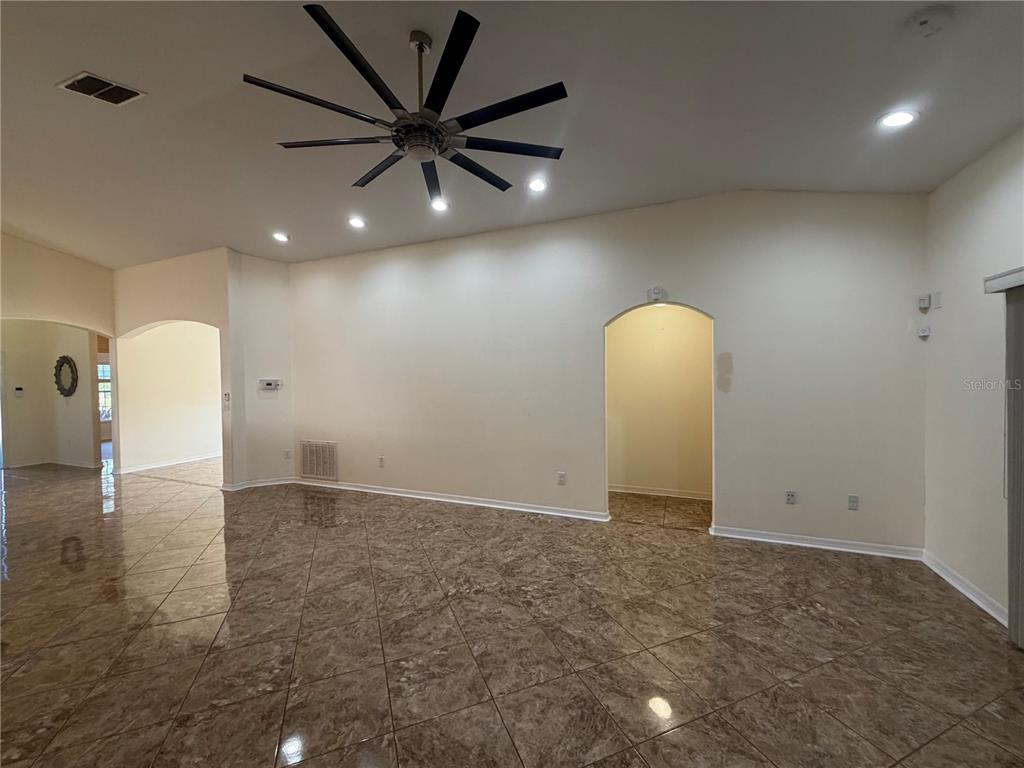 10214 Summer Azure Drive Riverview, FL 33578 - Photo 11 of 23 a view of a livingroom with a ceiling fan and window