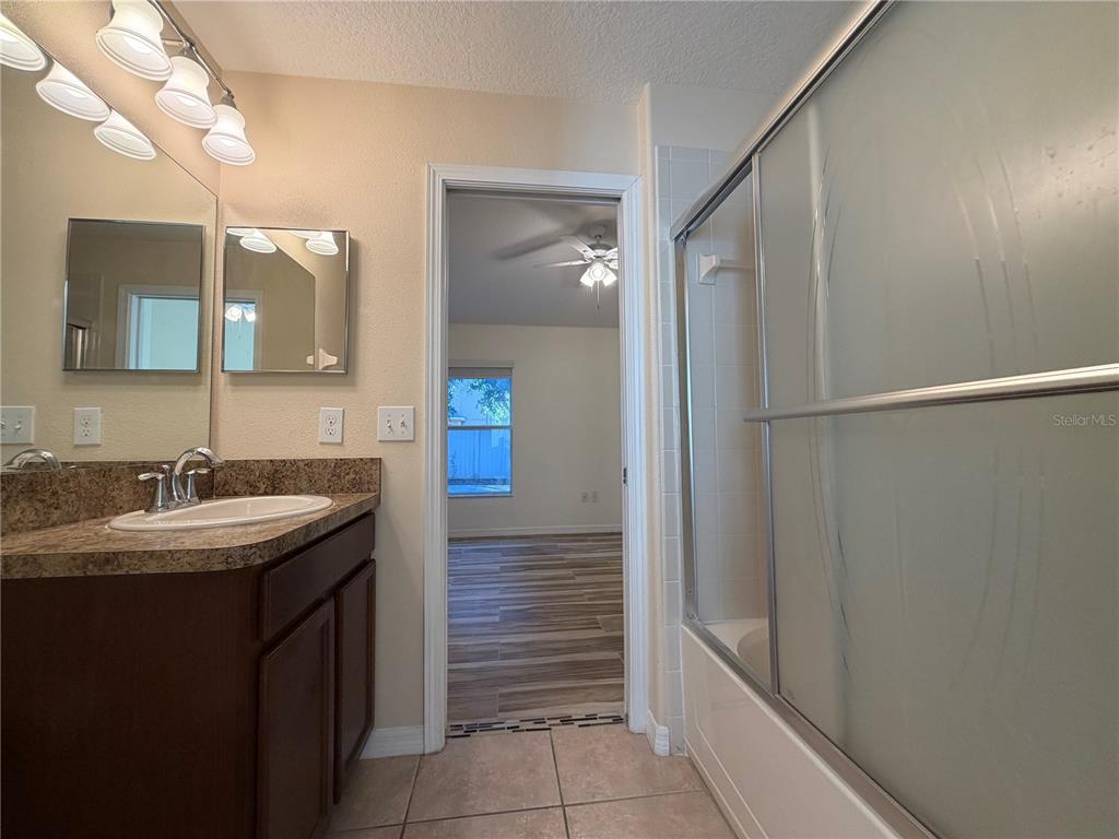 10214 Summer Azure Drive Riverview, FL 33578 - Photo 15 of 23 a bathroom with a sink and a mirror
