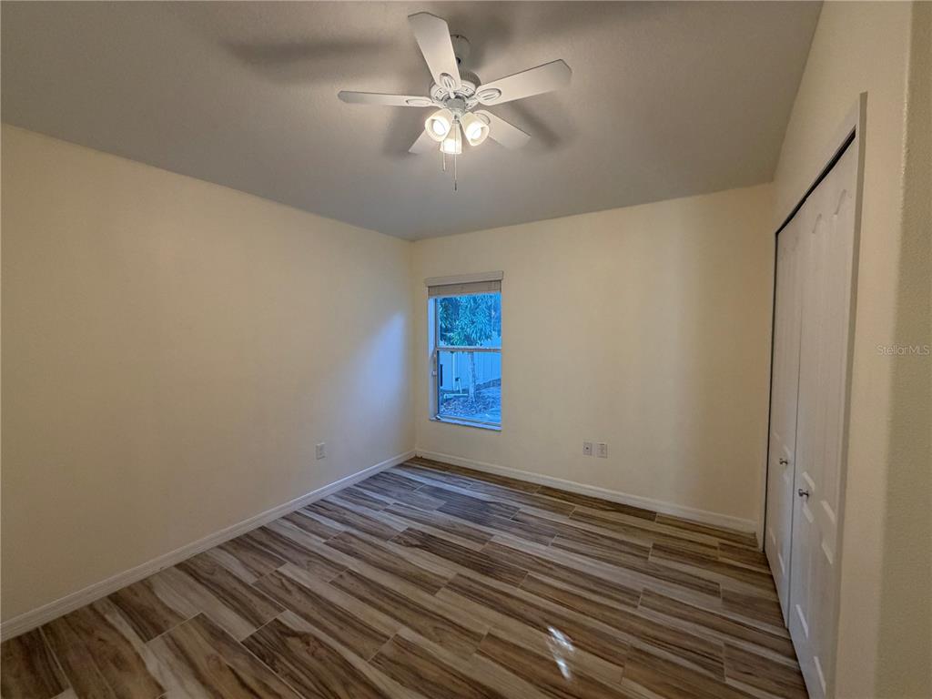 10214 Summer Azure Drive Riverview, FL 33578 - Photo 16 of 23 a view of an empty room with a window
