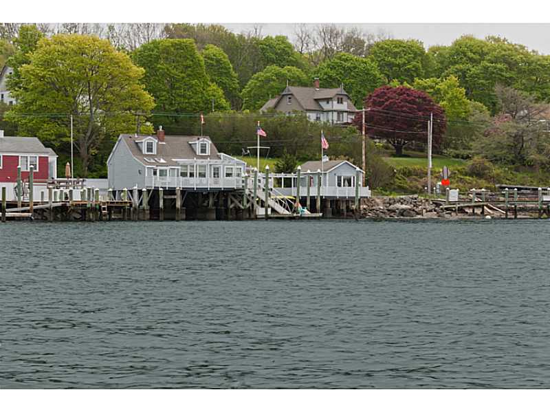 Exterior Front. Entry from the water