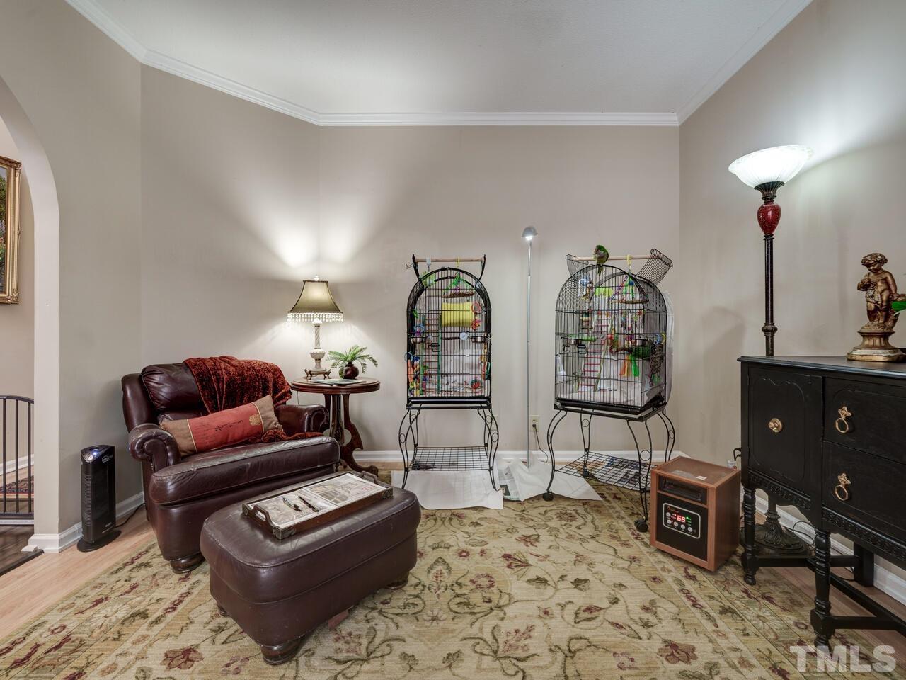 5933 Dunbarton Way Raleigh, NC 27613 - Photo 18 of 48 a living room with furniture and wooden floor