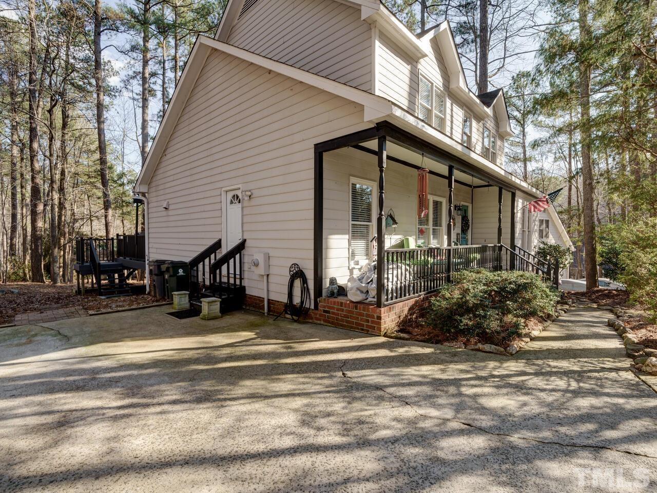 5933 Dunbarton Way Raleigh, NC 27613 - Photo 42 of 48 a view of a house with backyard