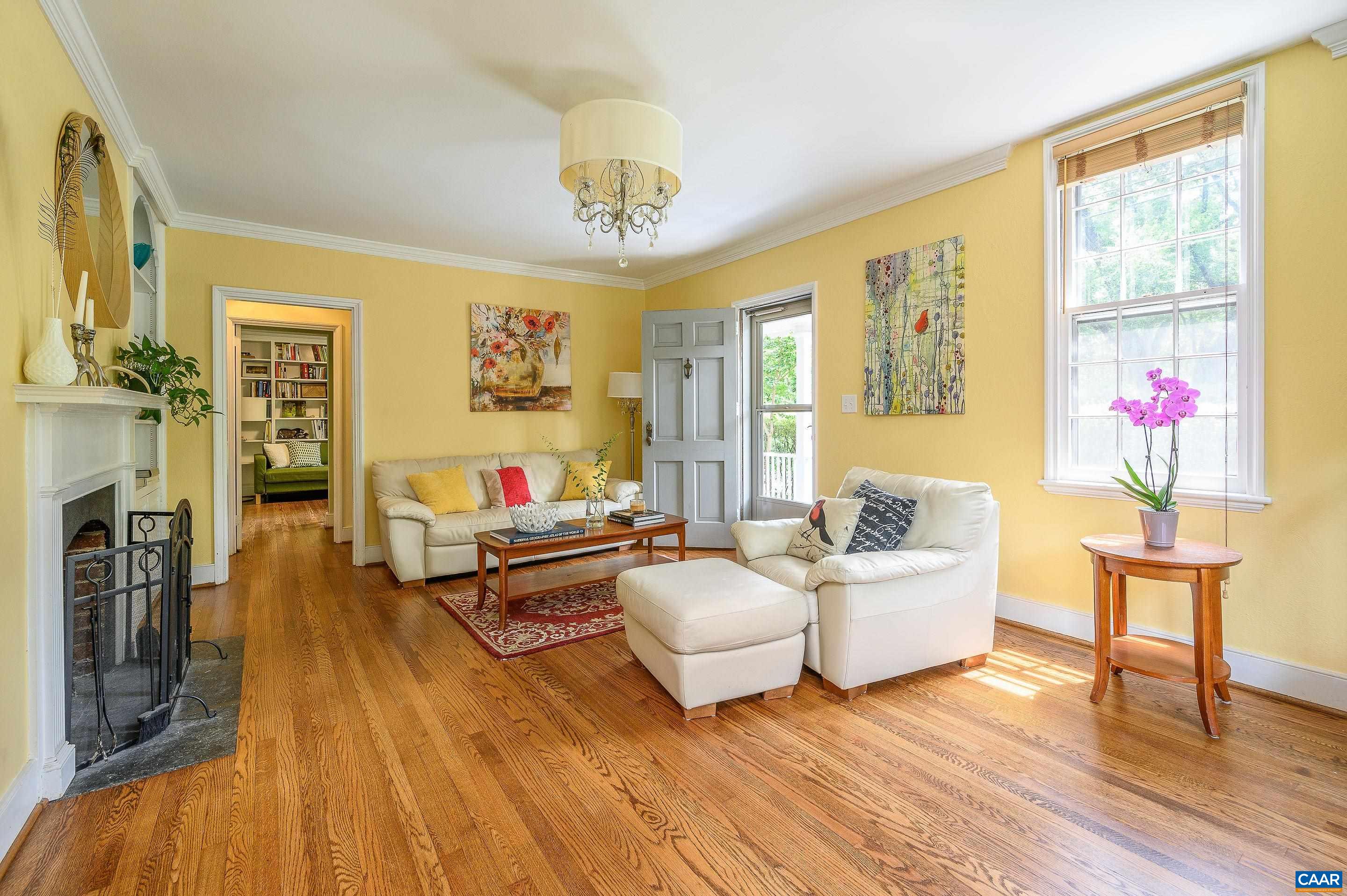 1939 Thomson Road Charlottesville, VA 22903 - Photo 5 of 35 a living room with furniture and a wooden floor