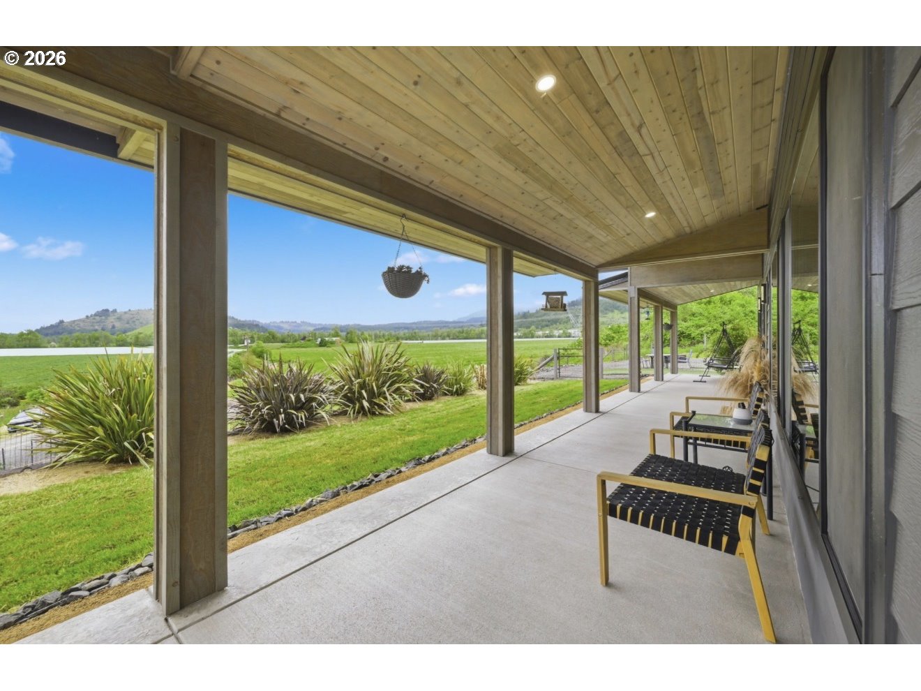 33192 Wilkins Road Eugene, OR 97408 - Photo 7 of 35 a view of a patio with a table and chairs