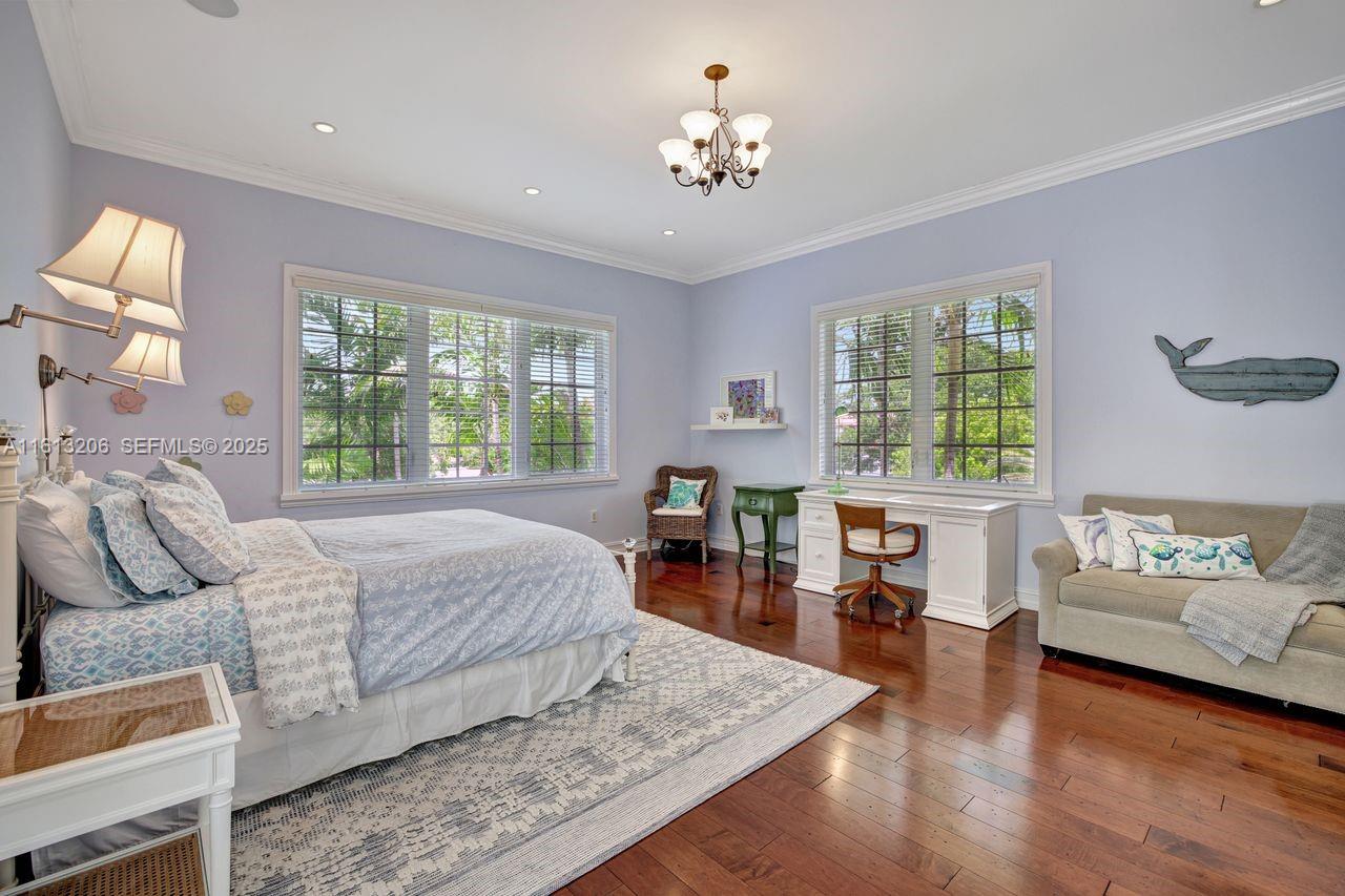 797 Ridgewood Road Key Biscayne, FL 33149 - Photo 13 of 23 a living room with furniture and a large window