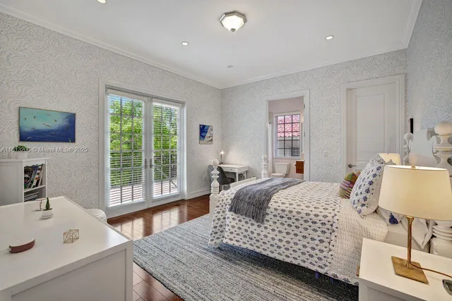 a bedroom with a bed and a table