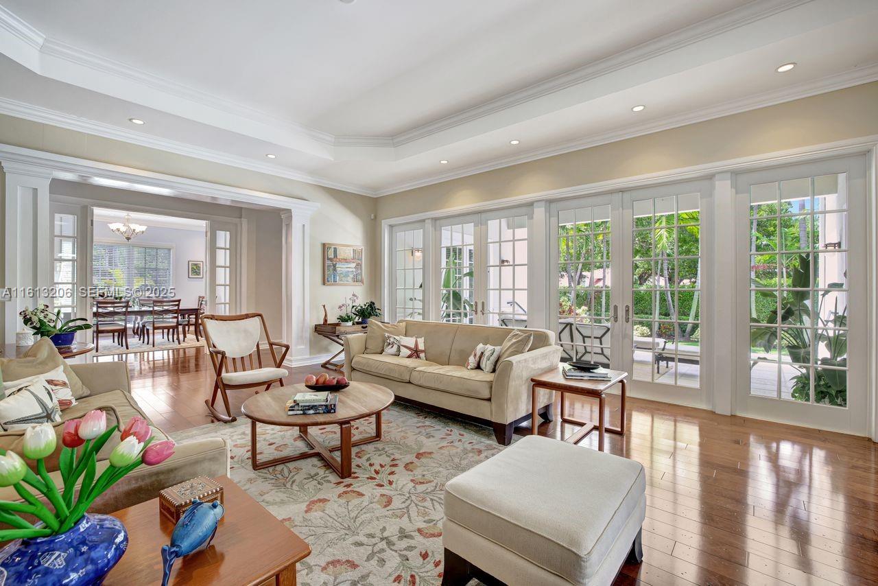 797 Ridgewood Road Key Biscayne, FL 33149 - Photo 5 of 23 a living room with furniture and a large window