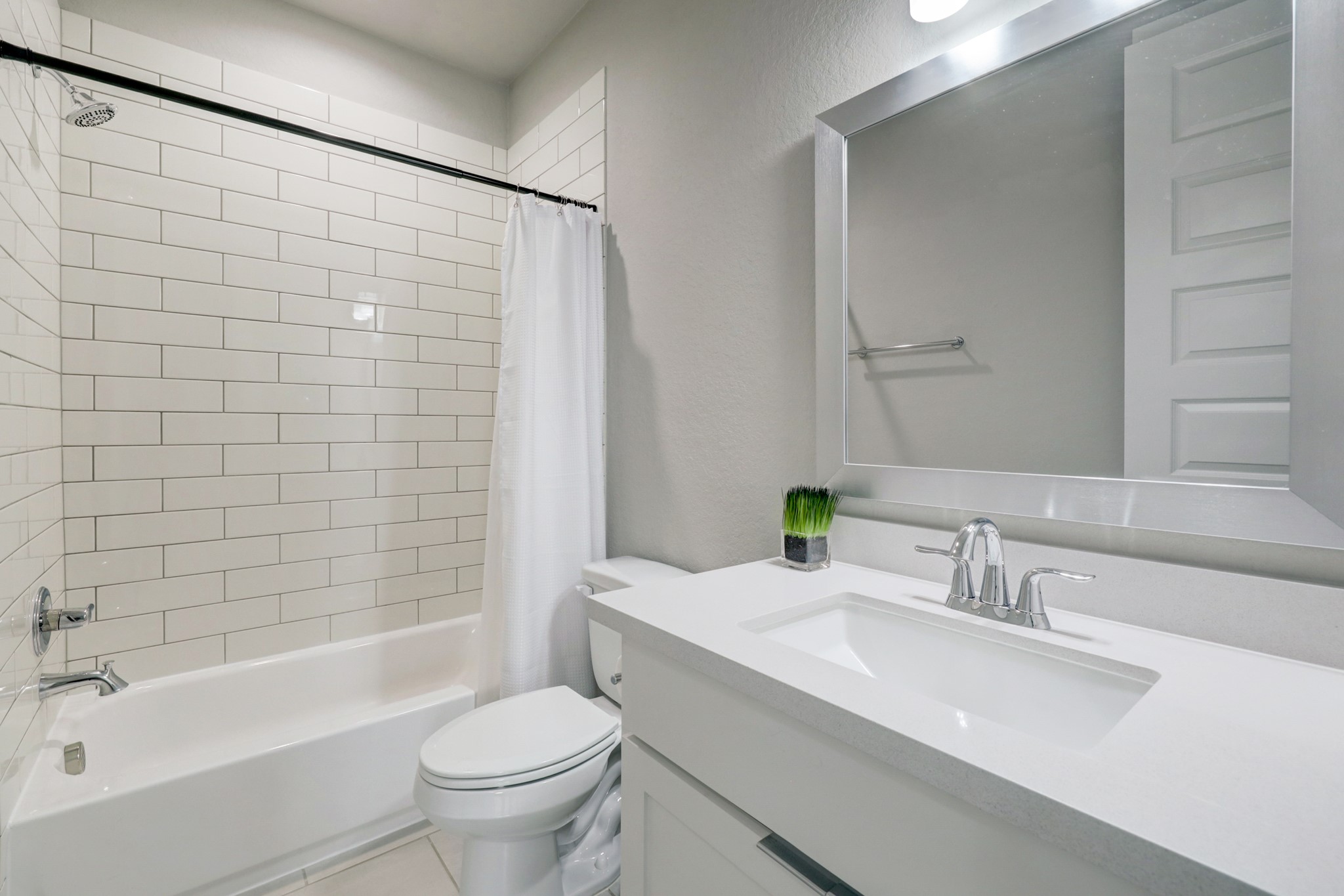 4203 Allen Street Houston, TX 77007 - Photo 22 of 35 a bathroom with a sink a toilet and shower