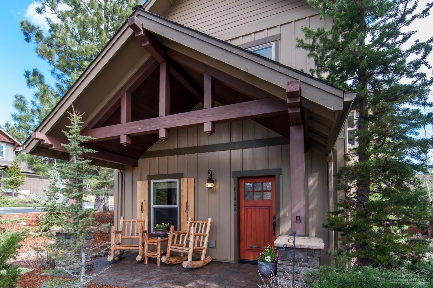 Exposed beams and a lodge-feel welcome y