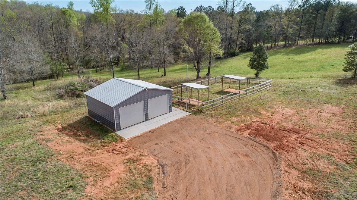 167 Mistr Lane Pickens, SC 29671 - Photo 46 of 49 New 2 car garage with pet kennel or chicken coop.