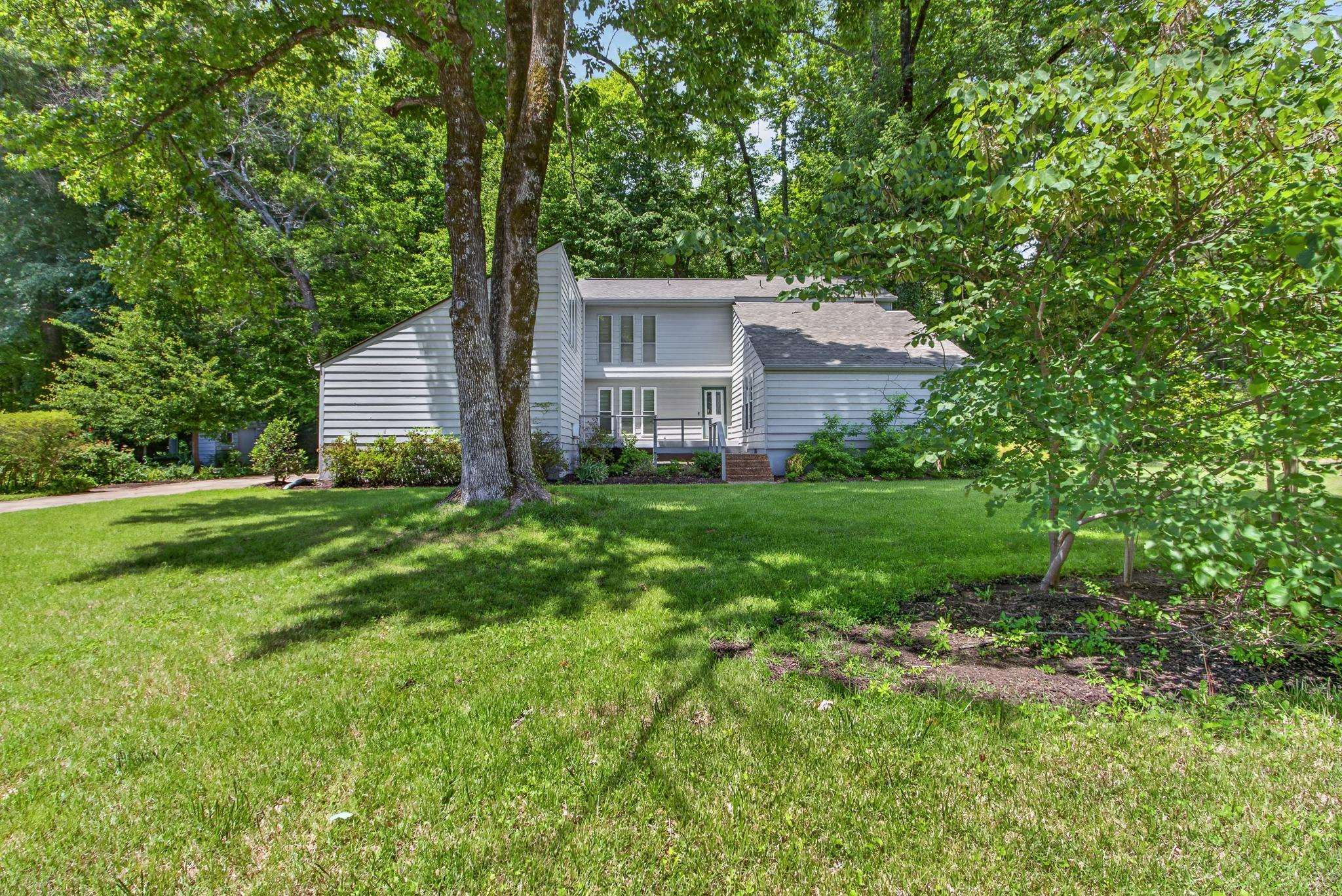 3121 Beechrun Drive Memphis, TN 38128 - Photo 1 of 40 Clean architectural lines, expansive windows and warm natural elements create striking curb appeal, while the meticulously maintained exterior reflects pride of ownership and timeless style!