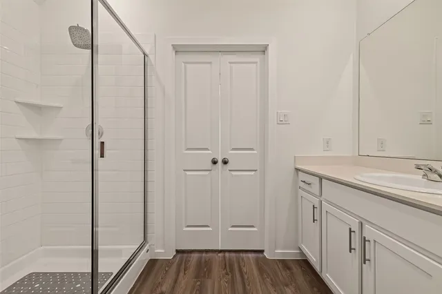 a bathroom with a sink and a mirror